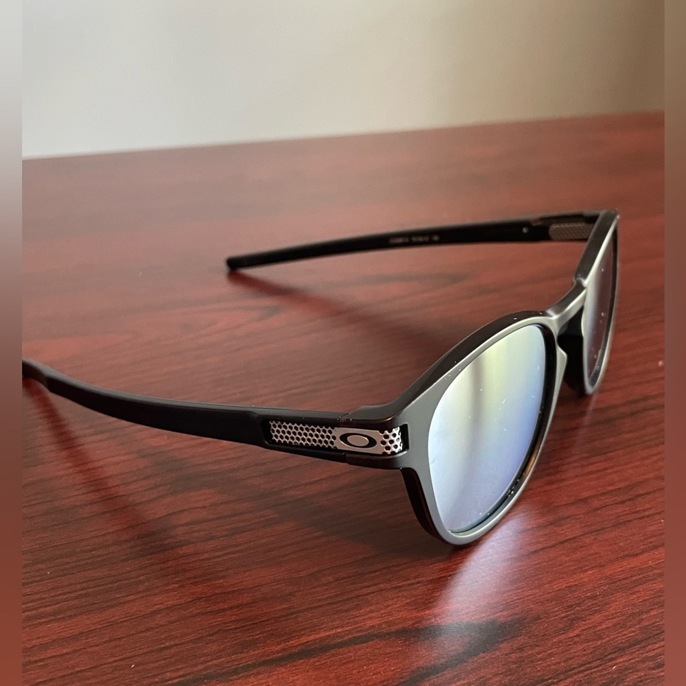 Oakley Latch sunglasses titanium lenses and extra pair of prism daily polarized